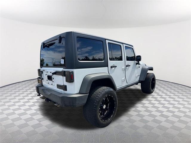 used 2014 Jeep Wrangler Unlimited car, priced at $19,732