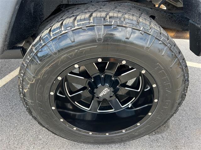 used 2014 Jeep Wrangler Unlimited car, priced at $19,732
