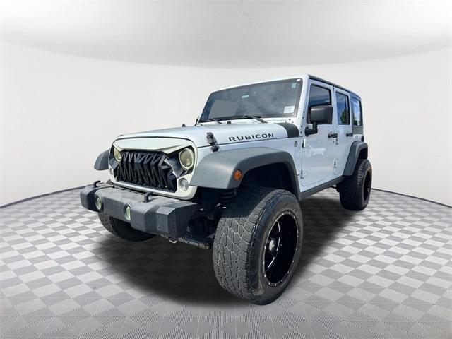 used 2014 Jeep Wrangler Unlimited car, priced at $19,732