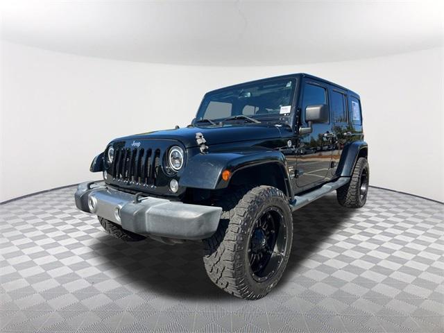 used 2014 Jeep Wrangler Unlimited car, priced at $17,755
