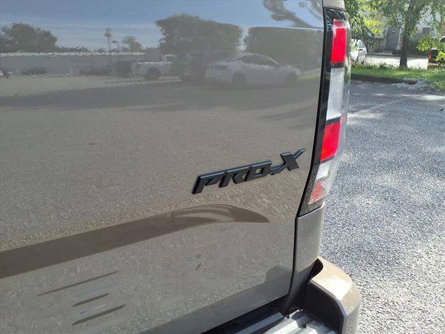 used 2024 Nissan Frontier car, priced at $34,800