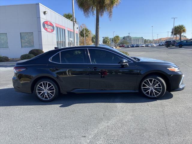 used 2023 Toyota Camry Hybrid car, priced at $32,453