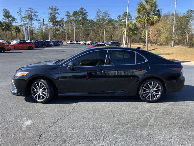 used 2023 Toyota Camry Hybrid car, priced at $32,453