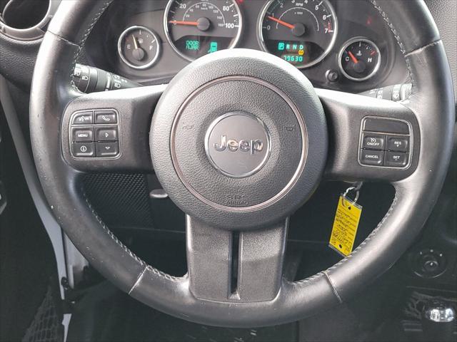 used 2012 Jeep Wrangler Unlimited car, priced at $17,869