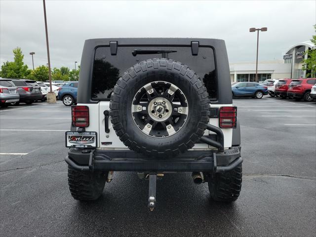 used 2012 Jeep Wrangler Unlimited car, priced at $17,869