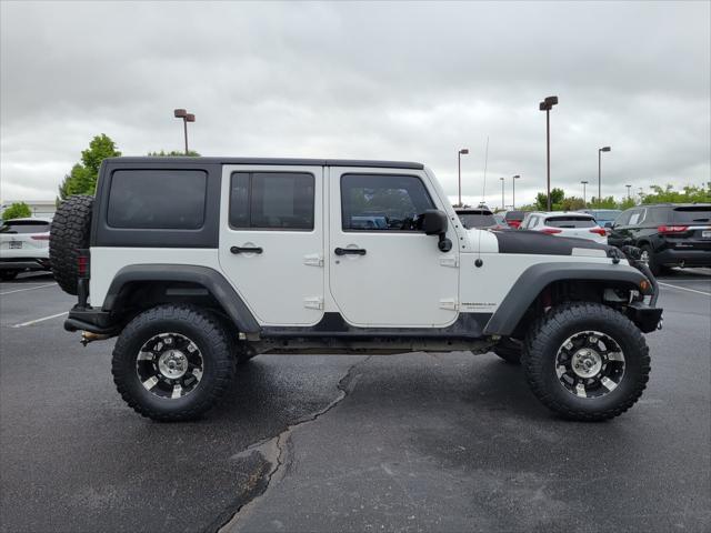 used 2012 Jeep Wrangler Unlimited car, priced at $17,869