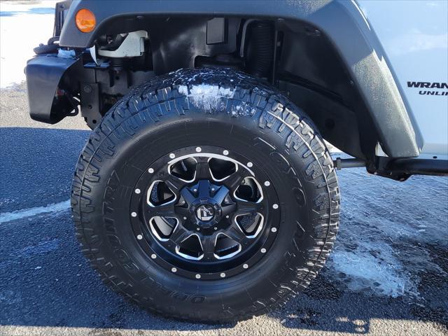 used 2014 Jeep Wrangler Unlimited car, priced at $19,138