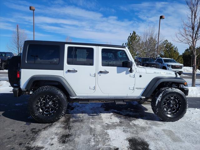 used 2014 Jeep Wrangler Unlimited car, priced at $19,138