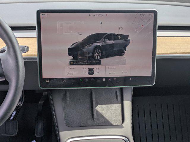 used 2024 Tesla Model Y car, priced at $29,188