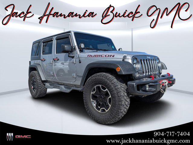 used 2014 Jeep Wrangler Unlimited car, priced at $19,697