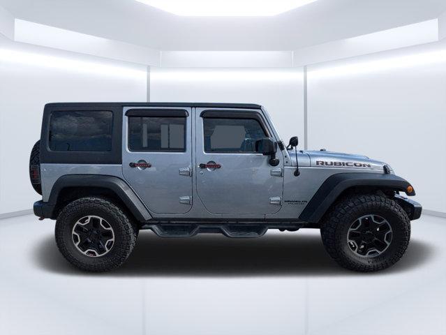 used 2014 Jeep Wrangler Unlimited car, priced at $19,697