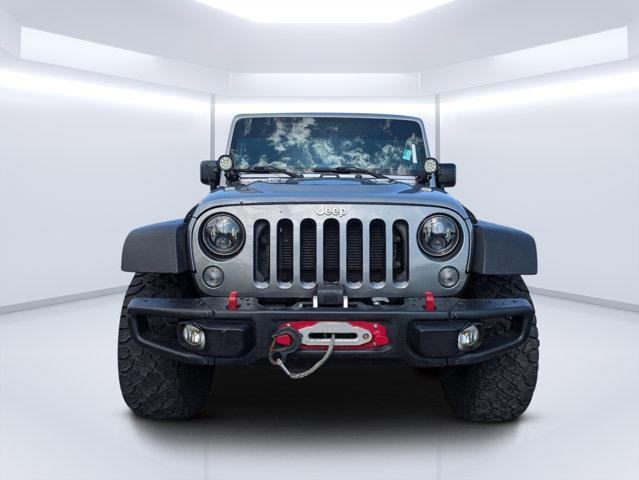 used 2014 Jeep Wrangler Unlimited car, priced at $19,697