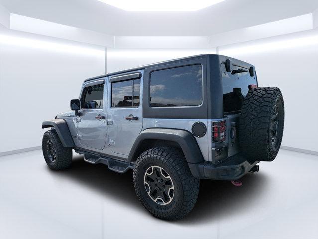 used 2014 Jeep Wrangler Unlimited car, priced at $19,697