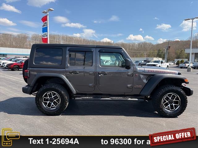 used 2024 Jeep Wrangler car, priced at $49,999