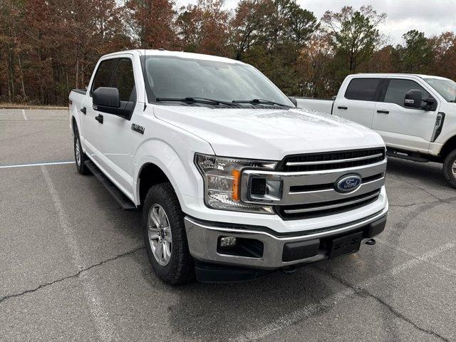 used 2018 Ford F-150 car, priced at $28,124