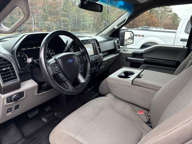 used 2018 Ford F-150 car, priced at $26,124