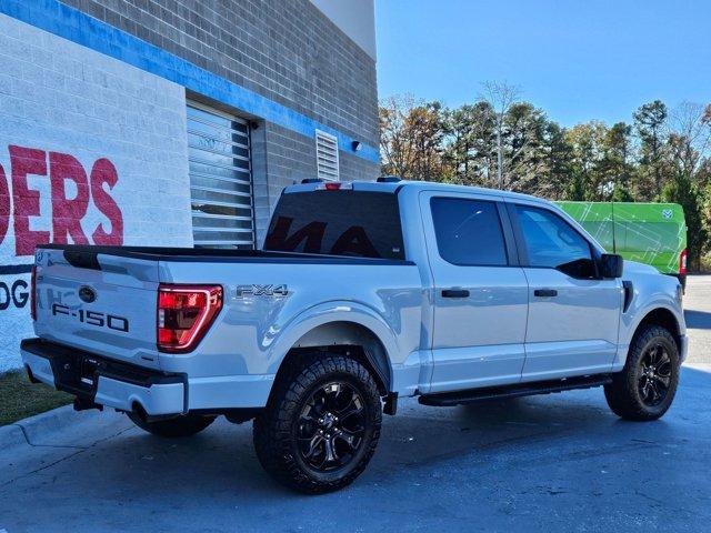 used 2023 Ford F-150 car, priced at $38,124