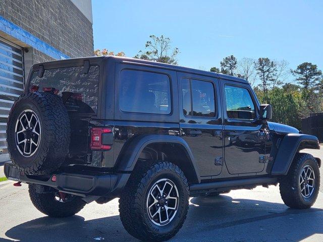 used 2024 Jeep Wrangler car, priced at $48,499