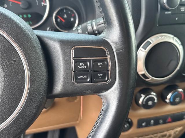 used 2011 Jeep Wrangler Unlimited car, priced at $11,790