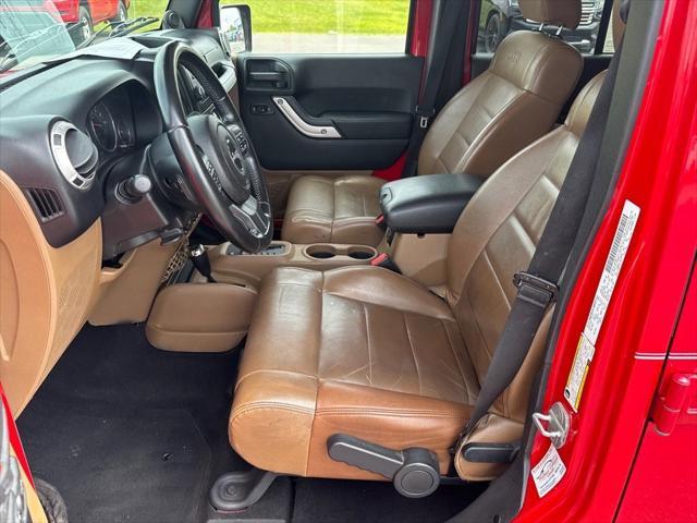 used 2011 Jeep Wrangler Unlimited car, priced at $11,790