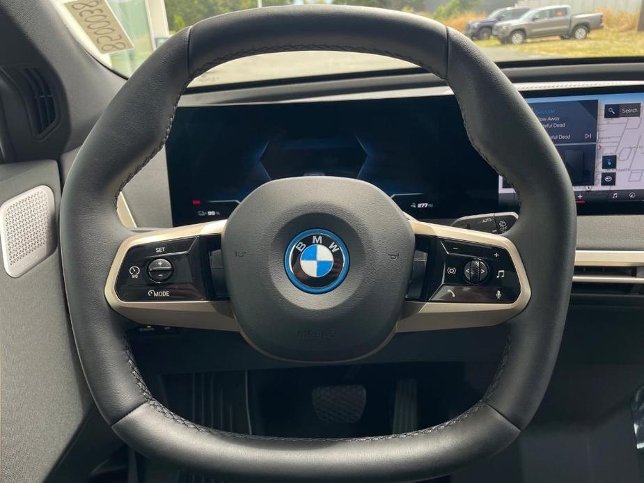 new 2024 BMW iX car, priced at $119,095