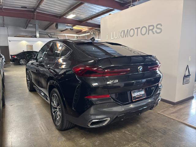 used 2022 BMW X6 car, priced at $56,777