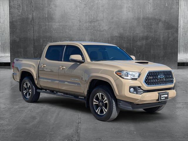 used 2018 Toyota Tacoma car, priced at $23,991