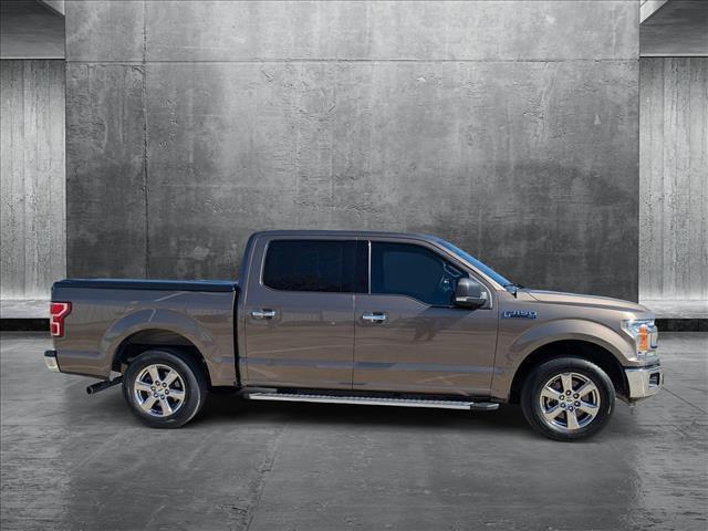 used 2018 Ford F-150 car, priced at $27,991