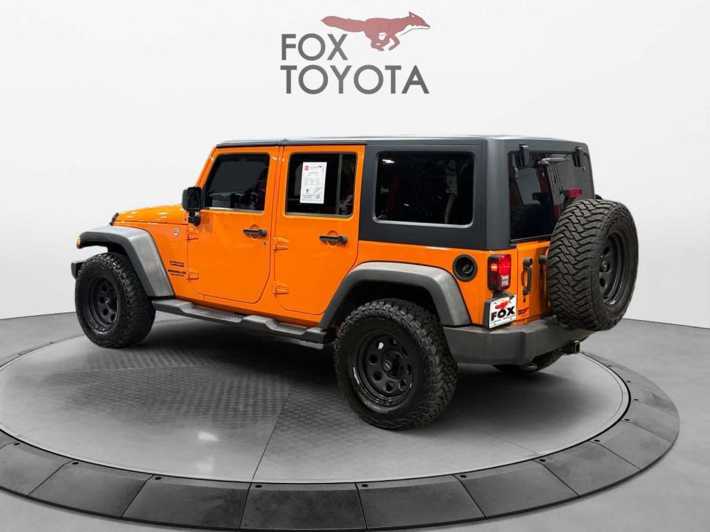 used 2012 Jeep Wrangler Unlimited car, priced at $13,859