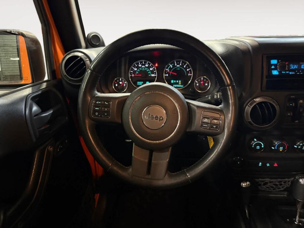 used 2012 Jeep Wrangler Unlimited car, priced at $13,859