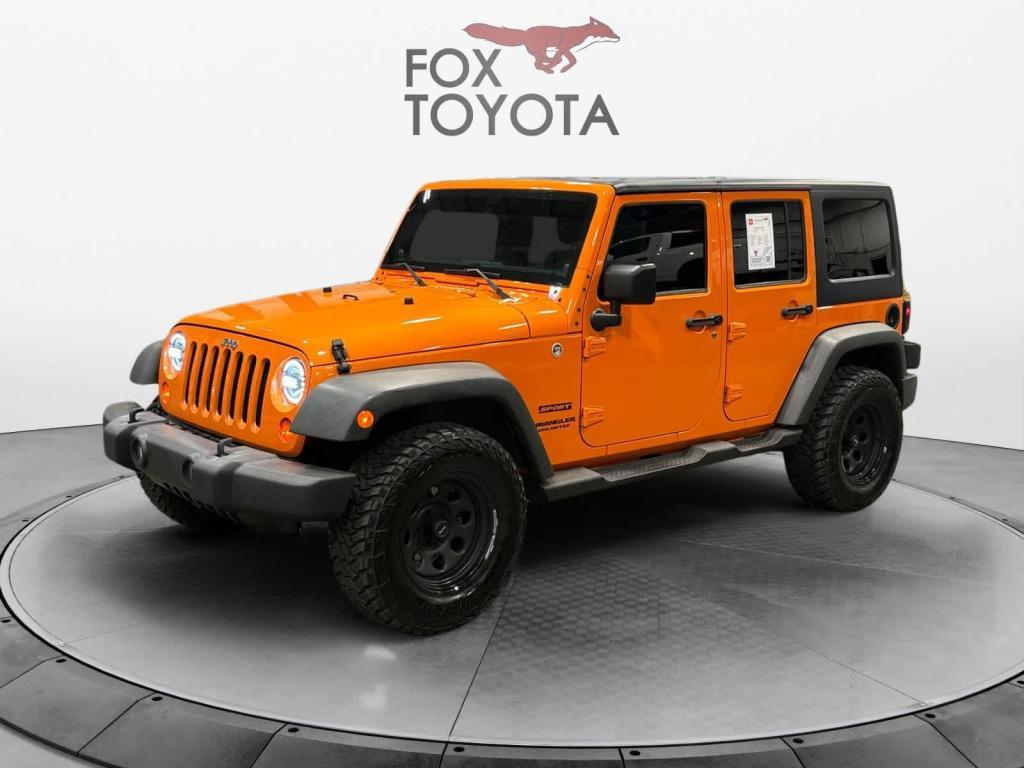 used 2012 Jeep Wrangler Unlimited car, priced at $13,859