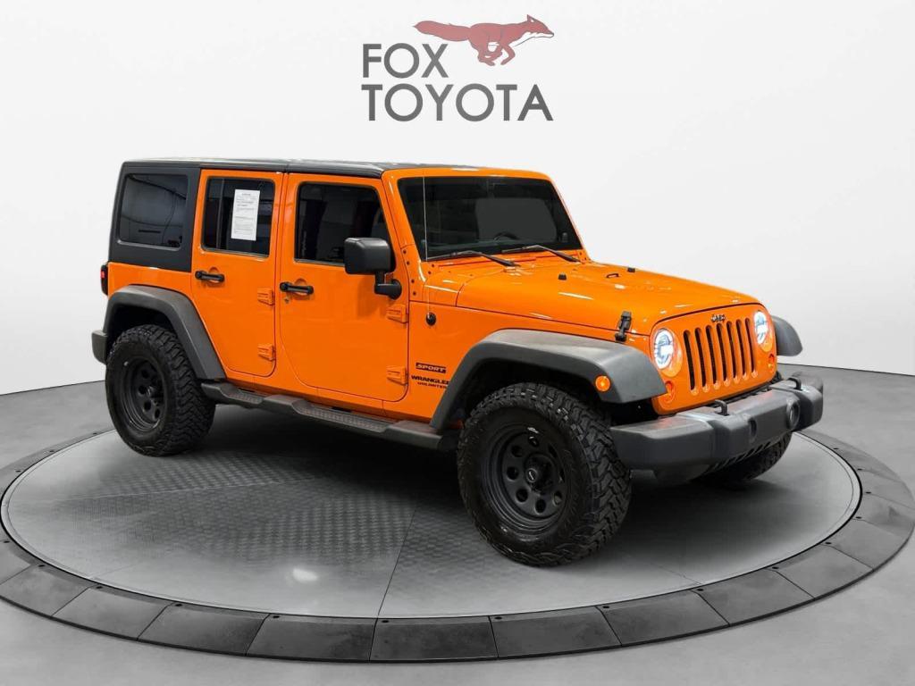 used 2012 Jeep Wrangler Unlimited car, priced at $13,859