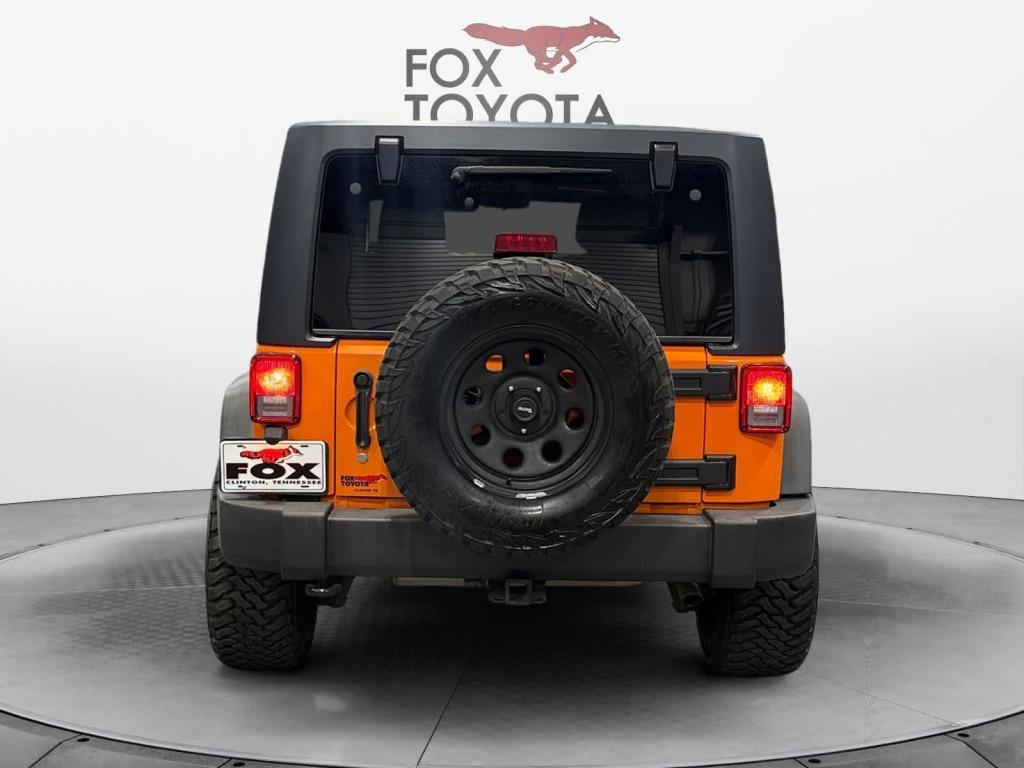 used 2012 Jeep Wrangler Unlimited car, priced at $13,859