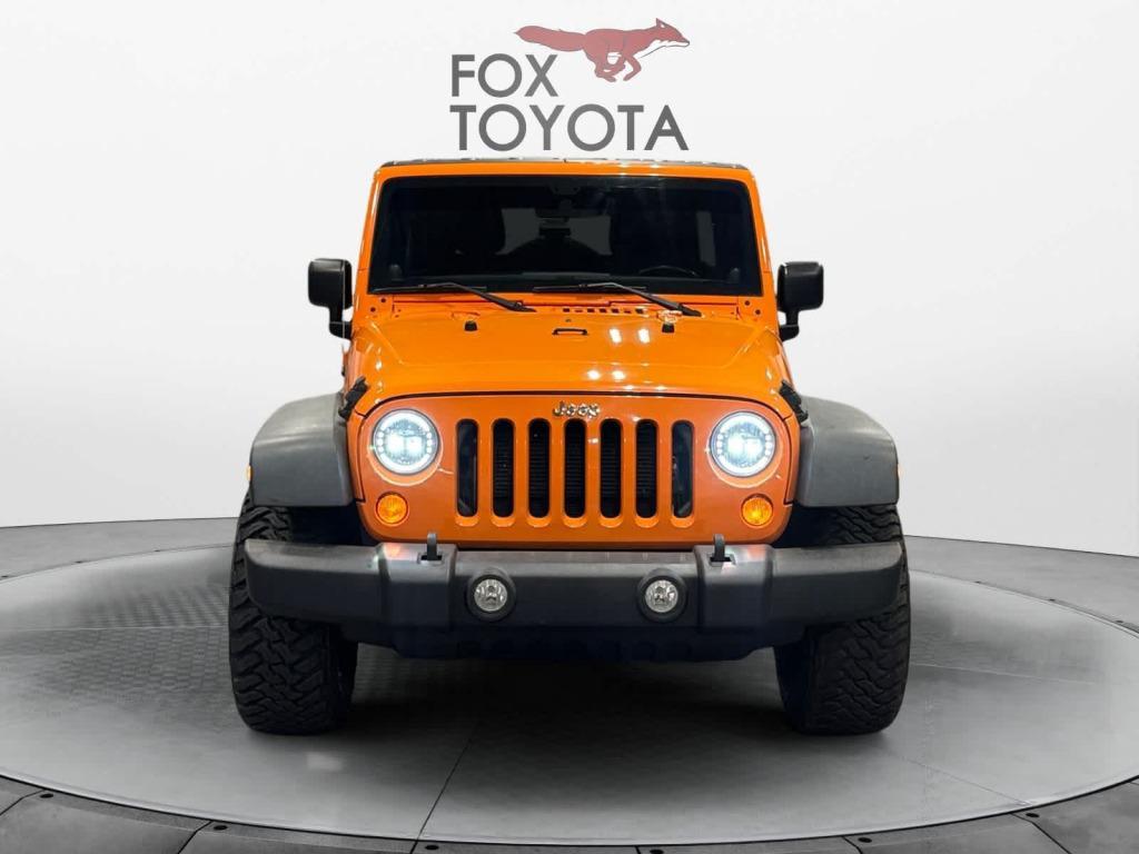 used 2012 Jeep Wrangler Unlimited car, priced at $13,859