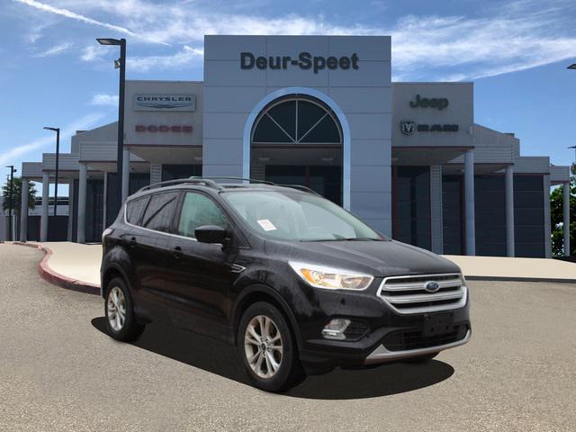 used 2018 Ford Escape car, priced at $13,900