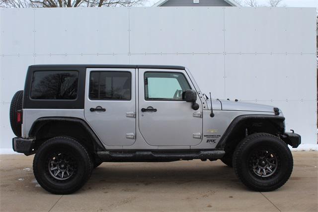 used 2015 Jeep Wrangler Unlimited car, priced at $16,790