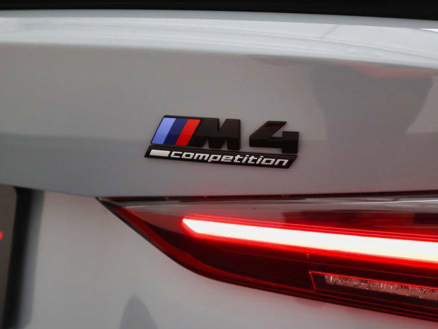 used 2024 BMW M4 car, priced at $78,437