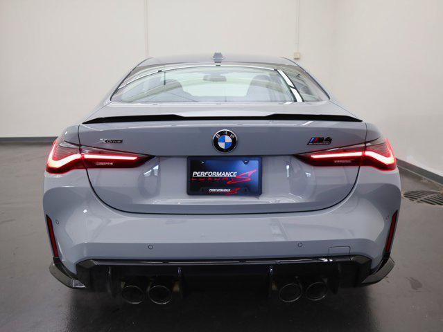 used 2024 BMW M4 car, priced at $78,437