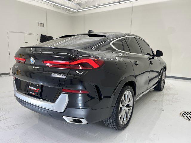 used 2023 BMW X6 car, priced at $55,900