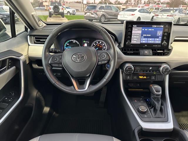 used 2021 Toyota RAV4 Hybrid car, priced at $32,980