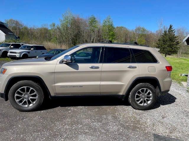 used 2014 Jeep Grand Cherokee car, priced at $12,975