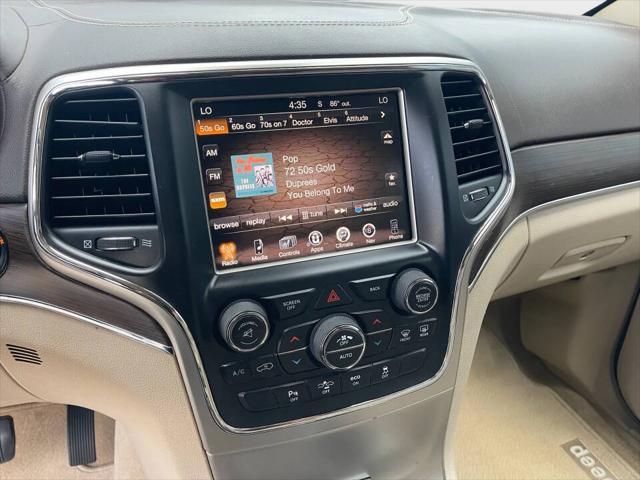 used 2014 Jeep Grand Cherokee car, priced at $14,990