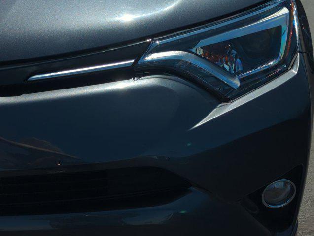 used 2018 Toyota RAV4 Hybrid car, priced at $26,422