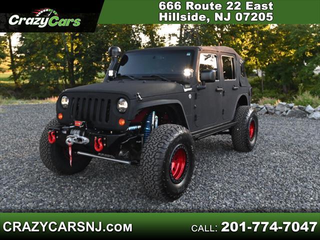 used 2013 Jeep Wrangler Unlimited car, priced at $15,995