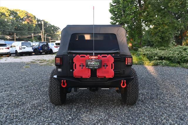 used 2013 Jeep Wrangler Unlimited car, priced at $15,995