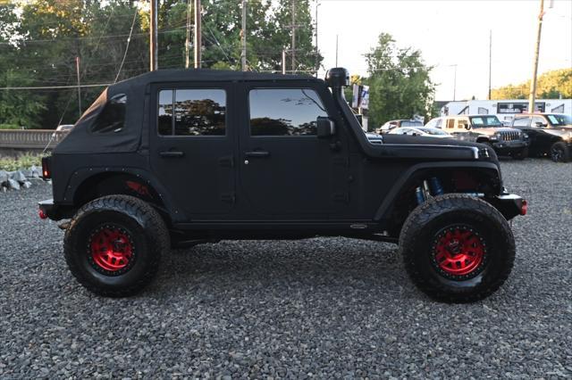 used 2013 Jeep Wrangler Unlimited car, priced at $15,995