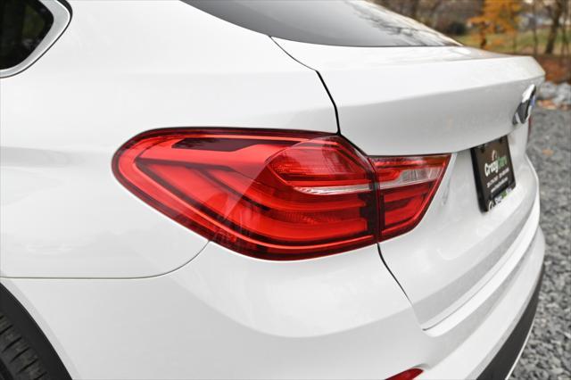 used 2016 BMW X4 car, priced at $15,995