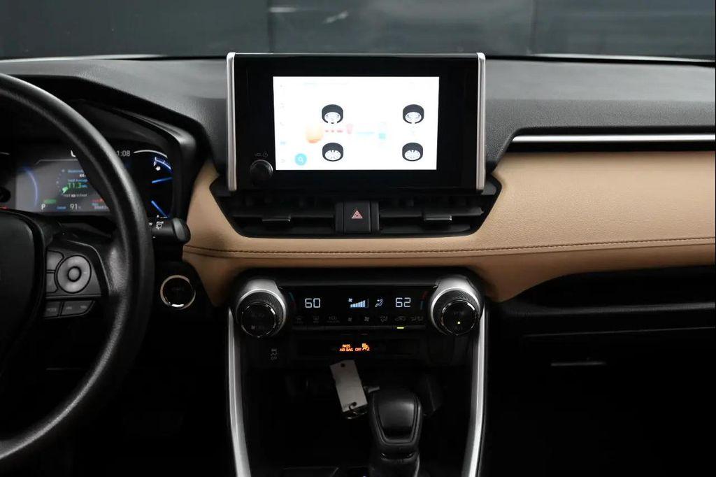 used 2023 Toyota RAV4 Hybrid car, priced at $24,495
