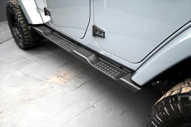 used 2014 Jeep Wrangler Unlimited car, priced at $12,695