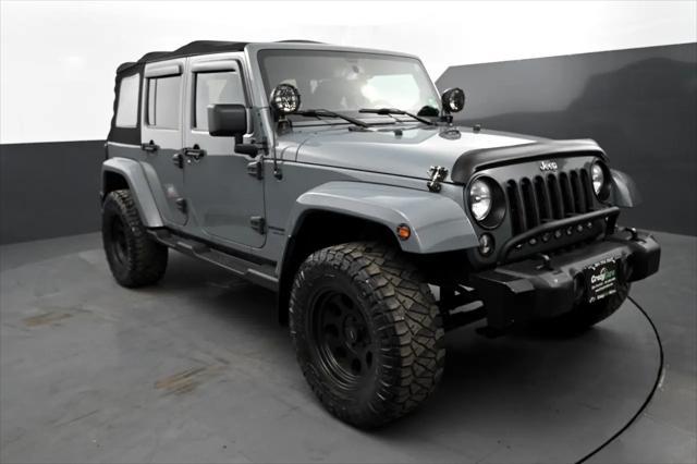 used 2014 Jeep Wrangler Unlimited car, priced at $12,695